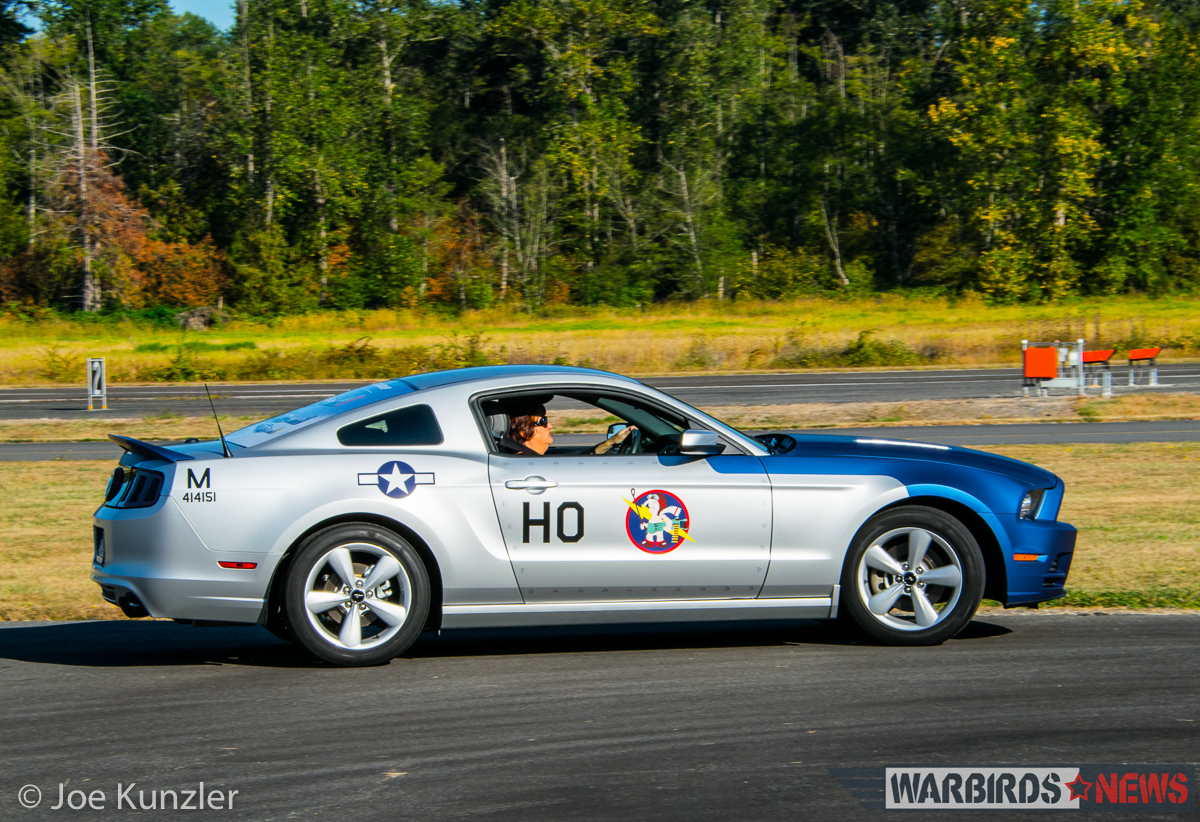 Props & Ponies at the Heritage Flight Museum - Air Show Report 17 Brendan Bayne in his Ford Mustang which he had painted to represent Lt.Col.John C Meyer's 352nd FG P-51 Mustang known as 'Petie 2nd. The well-known ace is credited with 24 aerial victories and the destruction of 13 enemy aircraft on the ground over his 200 or so combat missions in the European Theatre during WWII. ((photo by Joe Kunzler)