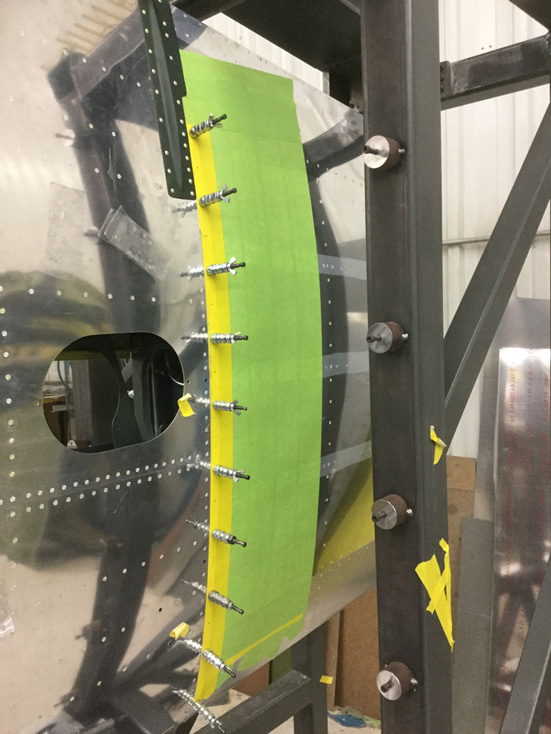 Texas Flying Legends P-51C Restoration Report 43 Colin has the wing extension panels completed and he is now drilling mounting holes to size. (photo via AirCorps Aviation)