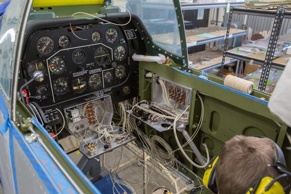 Texas Flying Legends P-51C Restoration Report 32 A similar shot to the previous one, but this time showing the pilot's main switch box opened up as well. (photo via AirCorps Aviation)