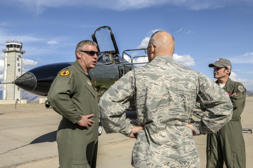 Retiring QF-4 stops in at Aviation Nation 13 Lt. Col. Ron King, left, and Jim Harkins, both pilots from the 82nd Aerial Targets Squadron, Detachment 1, Holloman Air Force Base, New Mexico, talk with Col. Dana Pelletier, 75th Mission Support Group commander, during a QF-4 Aerial Target aircraft static display at Hill AFB, Oct. 25. (U.S. Air Force photo by Paul Holcomb)