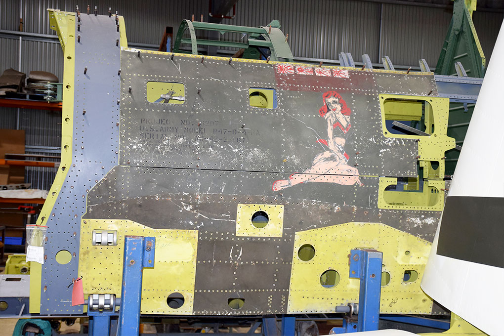 P-47 Thunderbolt Restorations Progress in Australia, Including Proposed Two-Seat Conversion 13 Republic P47 D 42 22687 in the workshop undergoing a full rebuild with a view of artwork