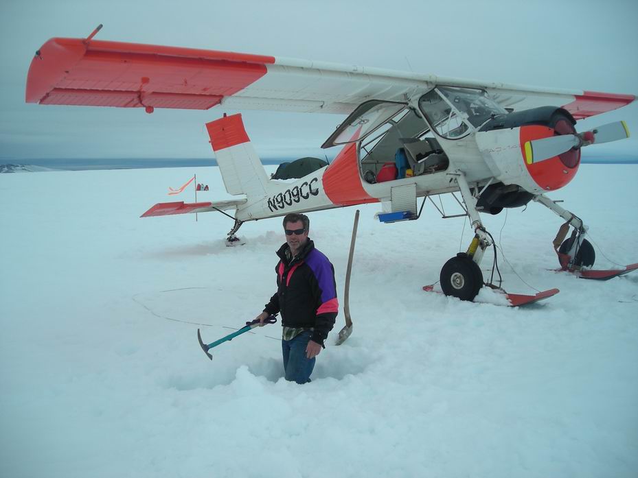 Arctic P-38 Lightning Recovery Set for this Summer! 13 Burying the rods to tie the Wilga support plane down to the ice cap. (photo via Ken McBride)