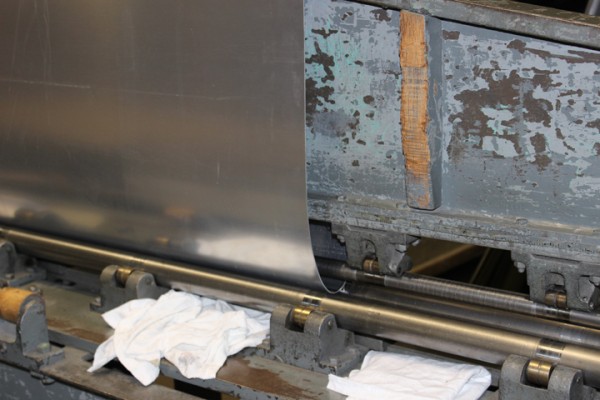 XP-82 Twin Mustang Restoration - February 2014 Update 16 A close-up of the leading edge skin in the Farnham roller. (photo via Tom Reilly)