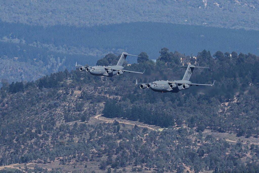 The Temora Air Force Centenary Showcase 44 Royal Australian Air Force C 17A Globemaster aircraft conduct a formation flypast over Canberra
