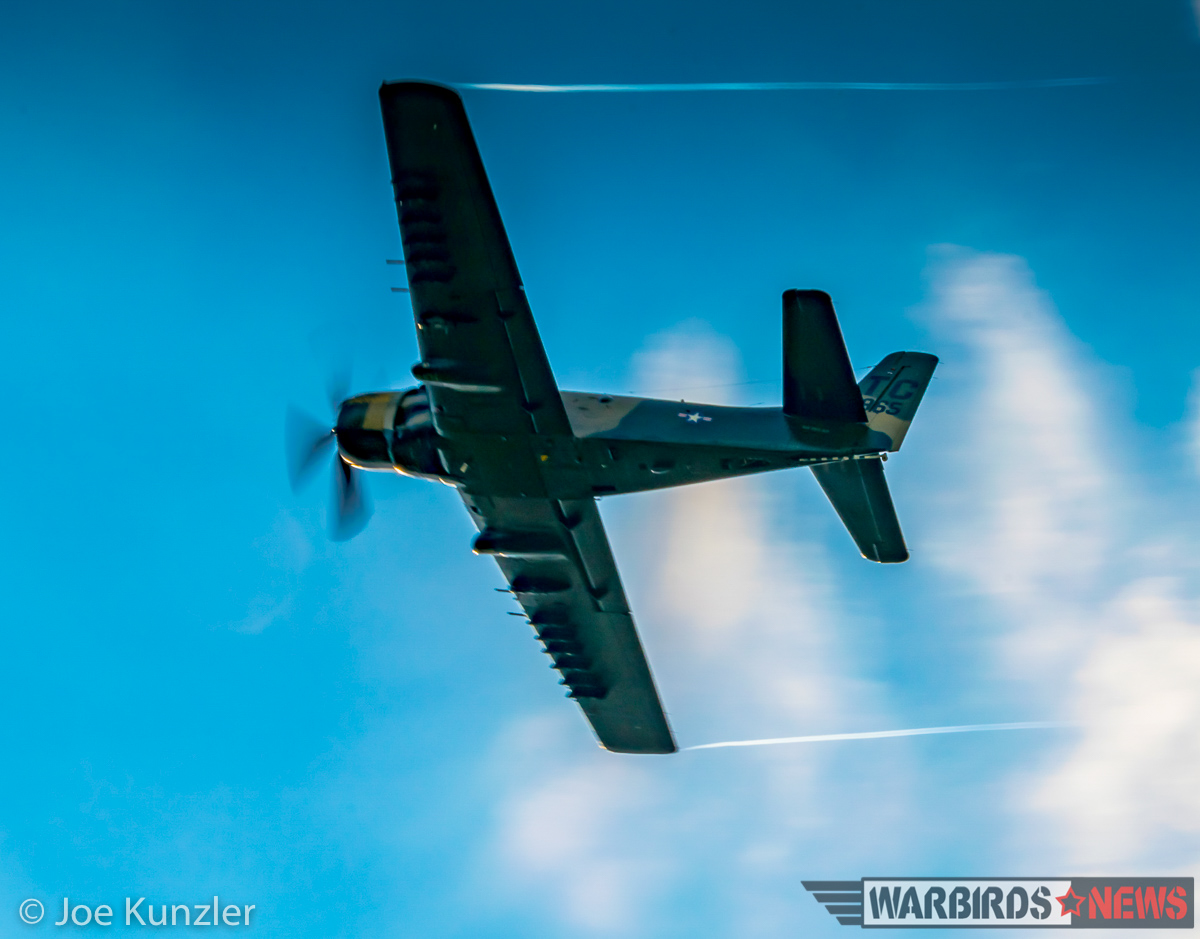Heritage Flight Museum - July 2016 Fly Day Report 26 The Skyraider pulled vapor trails of her wing tips during a high speed pass and climb out as she left for the Boeing Field celebrations. (photo by Joe Kunzler)