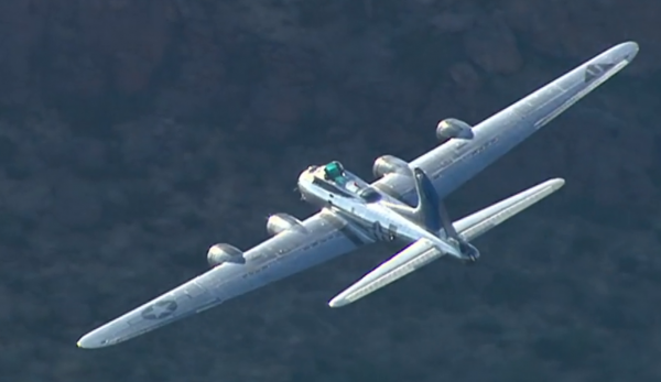 Impressive Video Of The CAF Arizona Wing's Bombers 10 Boeing B-17 Sentimental Journey flying low over Arizona's Superstition Mountains .