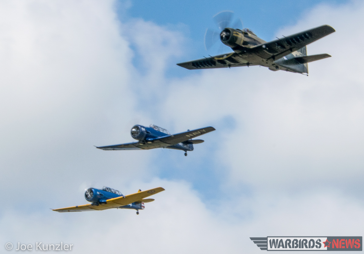 Heritage Flight Museum - July 2016 Fly Day Report 19 Greg Anders in the museum's Skyraider leading a three-ship with an SNJ and T-6F. (photo by Joe Kunzler)