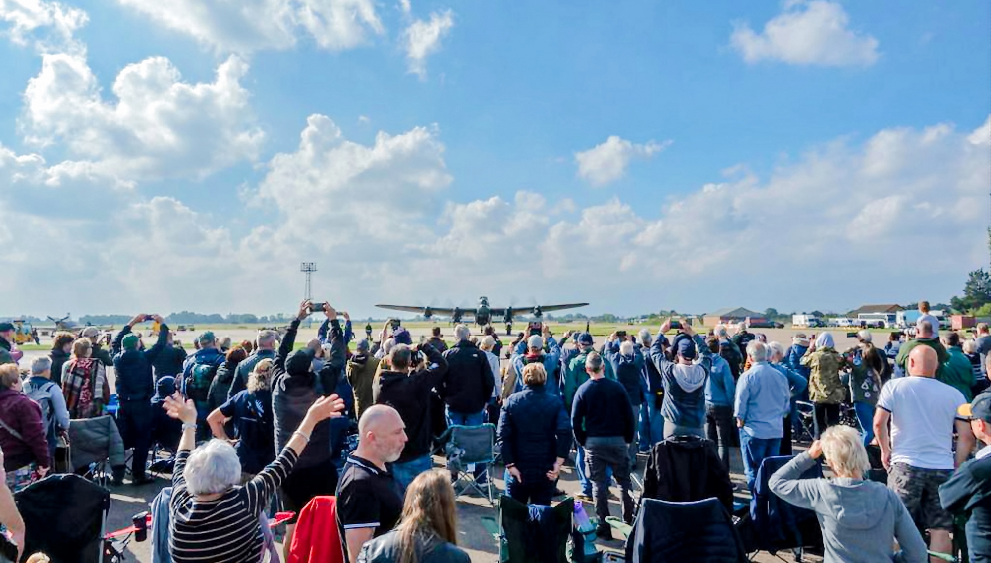 The Battle of Britain Memorial Flight Hosts 2025 Members’ Day at RAF Coningsby 10 Some of the members watching the Lancaster taxy in on 27th September Photo Richard Brown