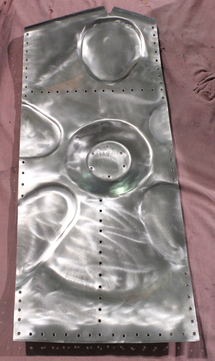 XP-82 Twin Mustang - October, 2017 - Restoration Update 23 The finished article, complete with rivet holes for mounting onto one of the main gear doors. (photo via Tom Reilly)