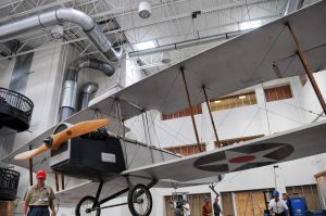 Niagara Aerospace Museum Builds its Collection 14 Standard J-1 being lowered from the ceiling of Rich Products' atrium. (Image Credit: Rich Products)