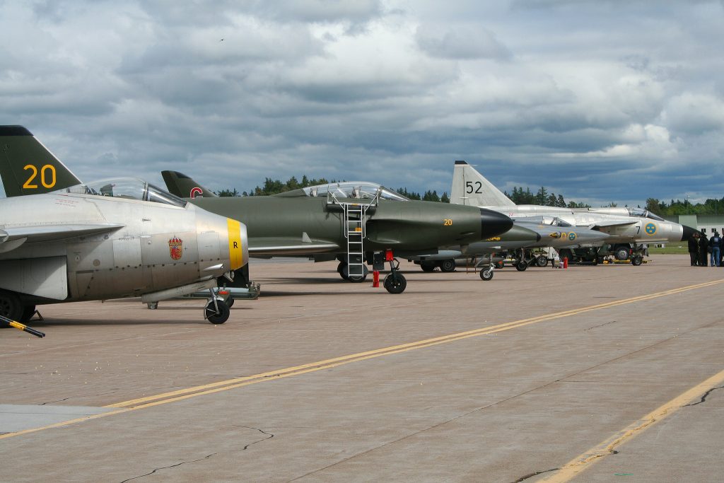 The Swedish Air Force Historic Flight From Within the Cockpit 19 SwAFHF's Tunnan, Lansen, Hunter, Draken and Viggen on the flight line. (Image Credit: Alan Wilson CC 2.0)