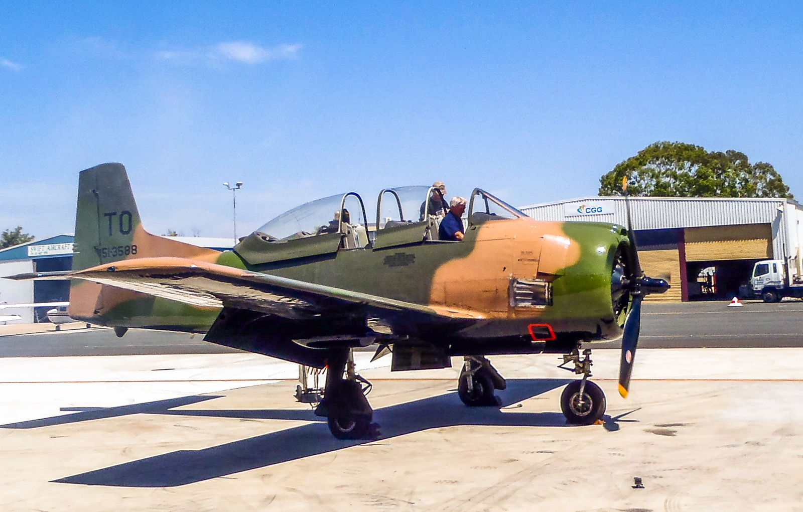 Combat Veteran T-28D Trojan Returning to Flight Downunder 14 Preparing for the engine runs recently. (photo by Chris Godfrey)