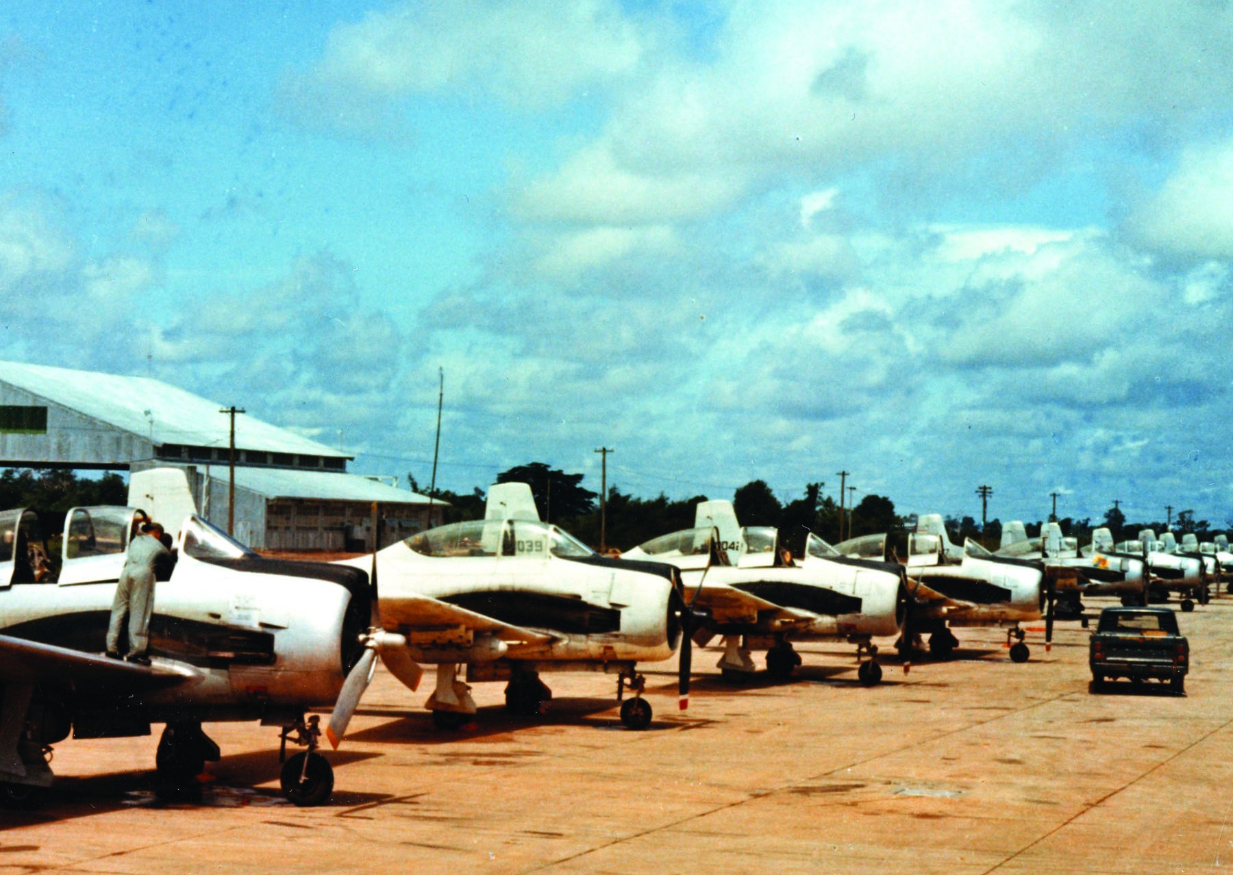 Combat Veteran T-28D Trojan Returning to Flight Downunder 11 A row of T-28Ds in Laos. It's very possible that Chris Godfrey's T-28 is in this image. (photo via USAF Museum)