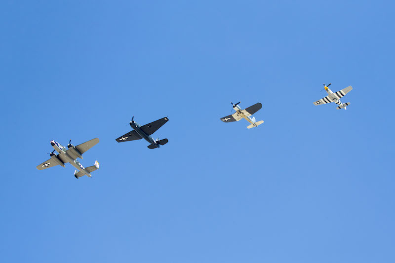 TFLM Airplanes Descend on Edwards for Upcoming 70th Anniversary of Supersonic Flight 11 EDWARDS AIR FORCE BASE, Calif. -- A four-ship formation of historic aircraft from the Texas Flying Legends Museum arrived at Edwards Air Force Base on Sept. 18, in preparation for celebrations of the 70th anniversary of the U.S. Air Force's birthday, as well as the world's first supersonic flight. The celebration is scheduled for Oct. 13 and 14, and is open to those with base access and their guests. Members of the public may join the celebration on Oct. 14 by registering for the Run with History Half Marathon at www.active.com. (U.S. Air Force photo illustration by Christopher Okula. This photo has been cropped to emphasize the subject.)