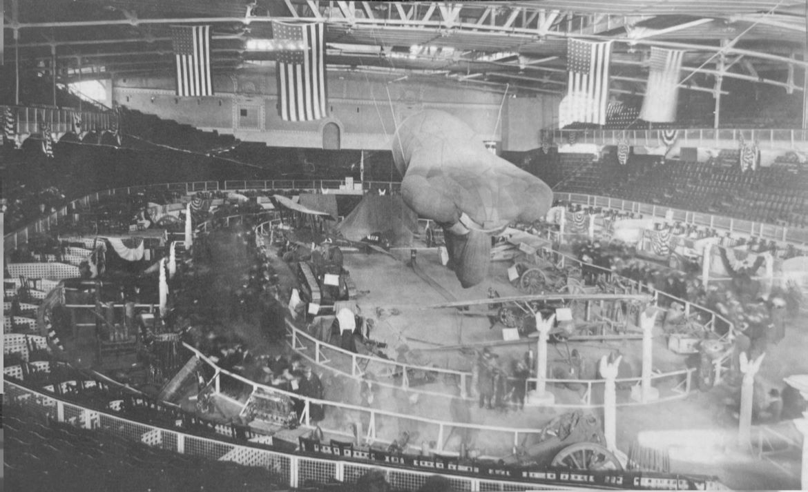 Smithsonian's Albatros D.Va 'Stropp': A Mysterious History Uncovered 17 The Allied War Exposition AWE displays at the Kansas City Convention Hall in December 1918. Stropp is placed below the tail of the Caquot observation balloon Norwich University Archives