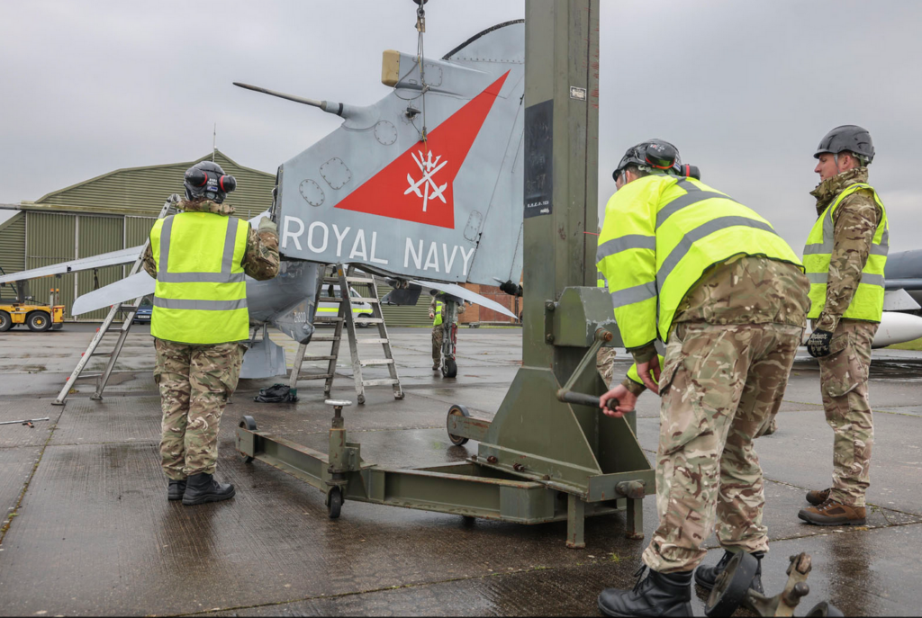 Veteran Naval Aircraft Head to Falklands For New Exhibition on 1982 Conflict 11 The JARTS team manouevre the removed tail fin away from the Sea Harrier
