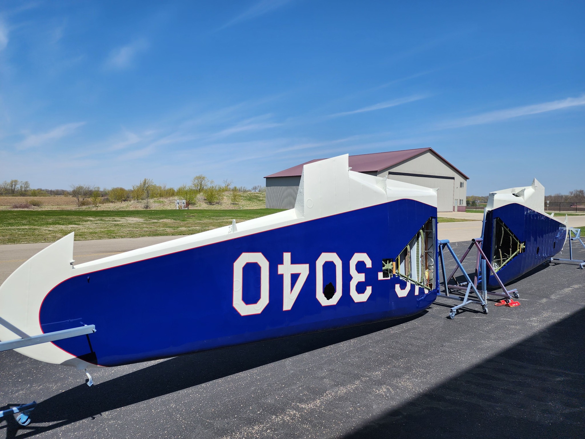 Pepsi-Cola Stinson Reliant at Oshkosh 21 The Reliant s wings shortly after painting Garry Ackerman
