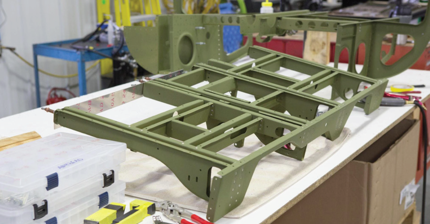 Cadet Air Corps Museum AT-10 Restoration Project 19 The floor goes together on the bench.