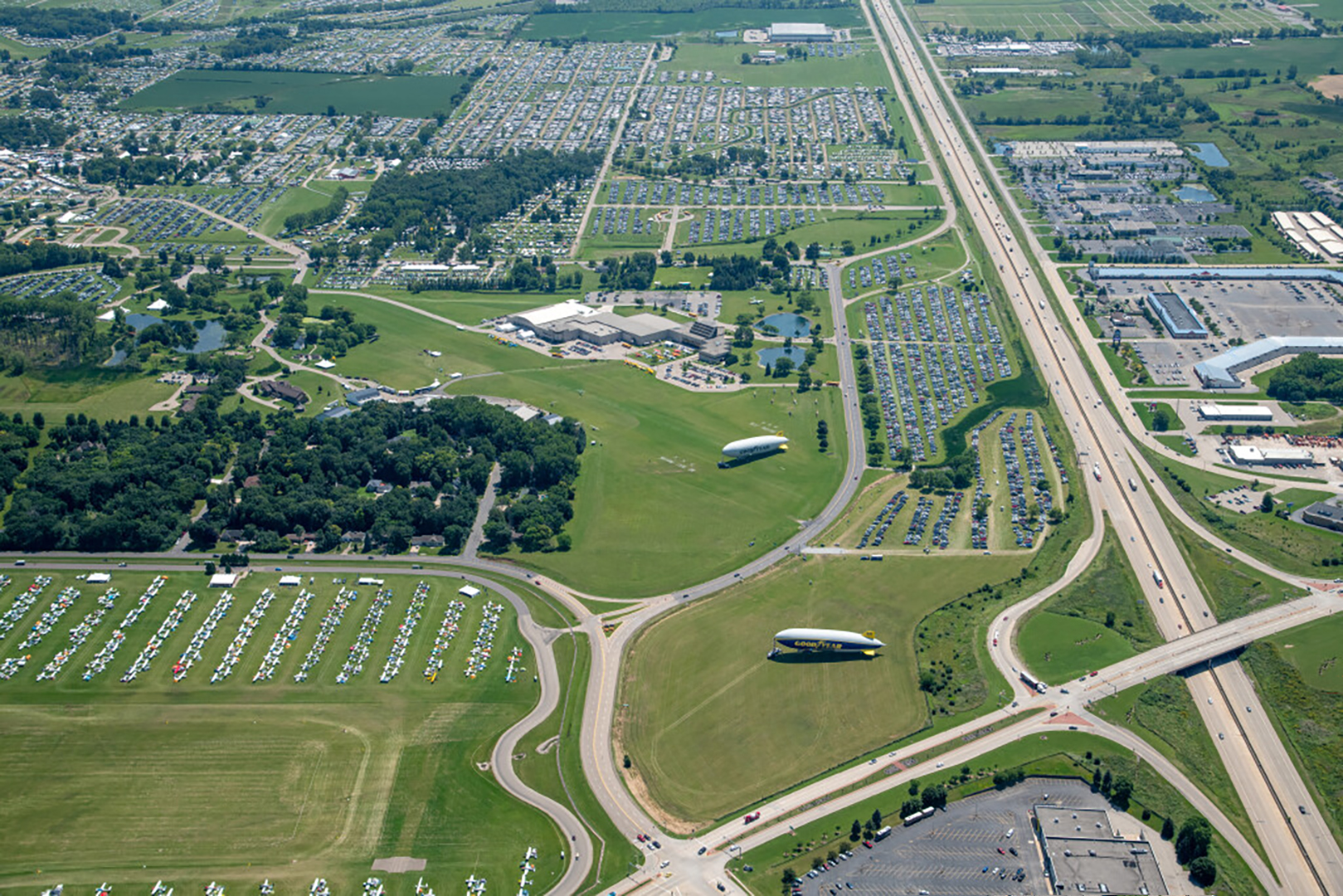Records Set at the World’s Greatest Aviation Celebration: EAA AirVenture Oshkosh 2025 Soars to New Heights 14 The imposing silhouette of the C 17 Globemaster looms over the massive crowds that filled AirVenture each day Camping Grounds