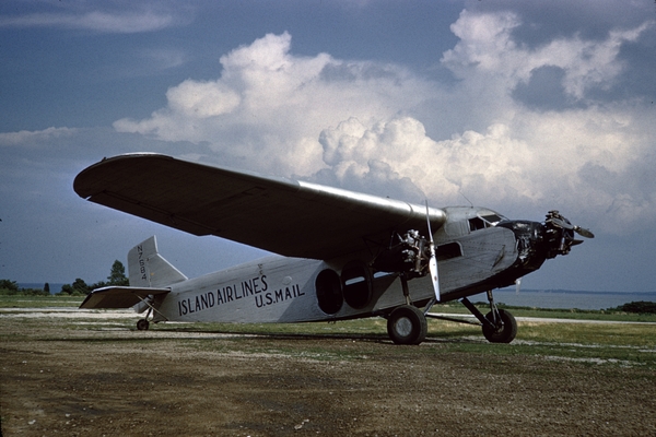 Ford Trimotor Under Restoration at The Liberty Aviation Museum 11 Though Island Airlines Fords would become quite colorful they started out with just bare metal as shown with N7584 before its red white and blue scheme American Aviation Historical Society