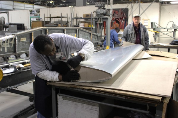 XP-82 Twin Mustang Restoration - February 2014 Update 17 Checking the shape of the leading edge wing skin against the template Tom took with him to Thrush Aircraft. (photo via Tom Reilly)