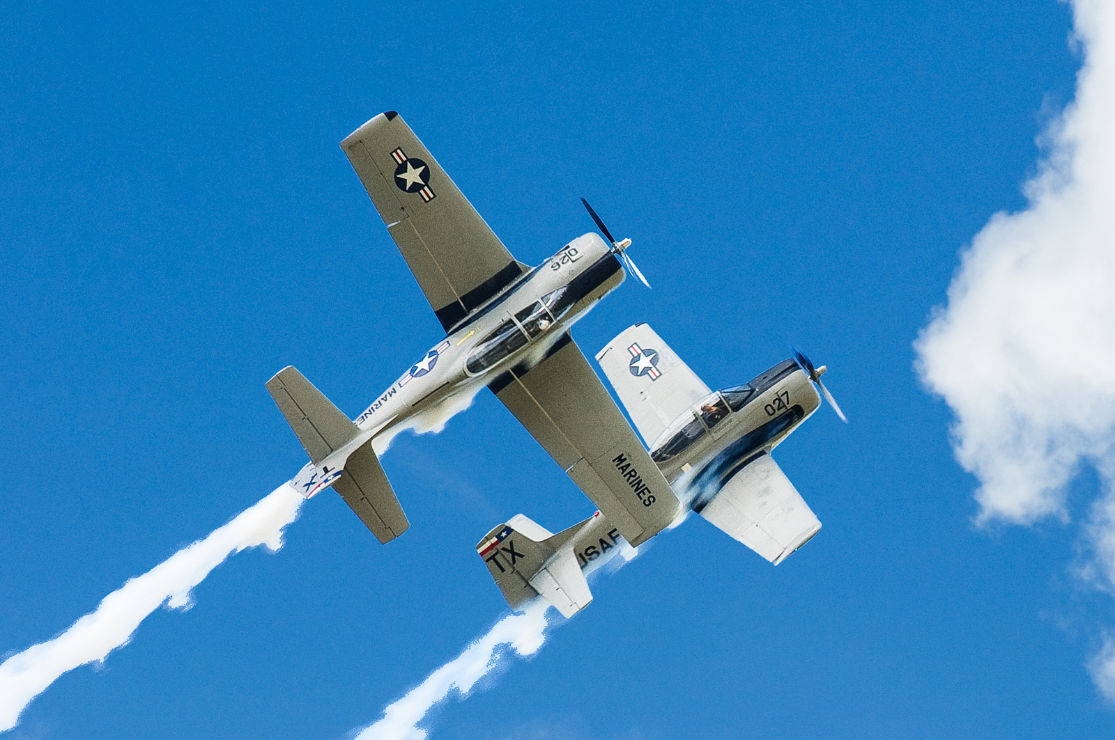 Trojan Phlyers T-28 Aerial Demo Team to Perform at Dakota Thunder Air Show 11 The two T-28Bs of the Trojan Phlyers perform close-in formation aerobatics, as is amply demonstrated here. (photo via Trojan Phlyers)