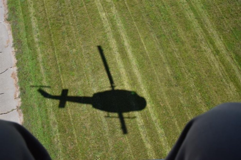 Vietnam-Era Huey Helicopter to Fly Over Portage and Kalamazoo 13 UH 1H Huey Greyhound S N 66 01126 Michigan Flight Museum Shadow