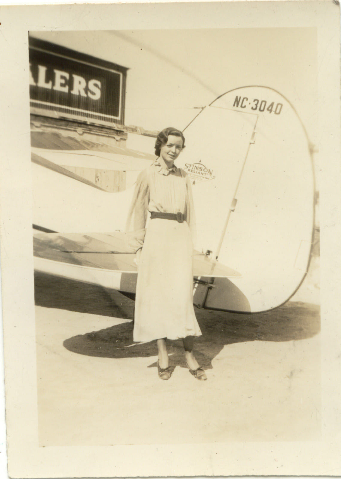 Pepsi-Cola Stinson Reliant at Oshkosh 11 Unidentified woman standing in front of NC3040 s tail before the Pepsi logos were added circa 1937 Credit Garry Ackerman