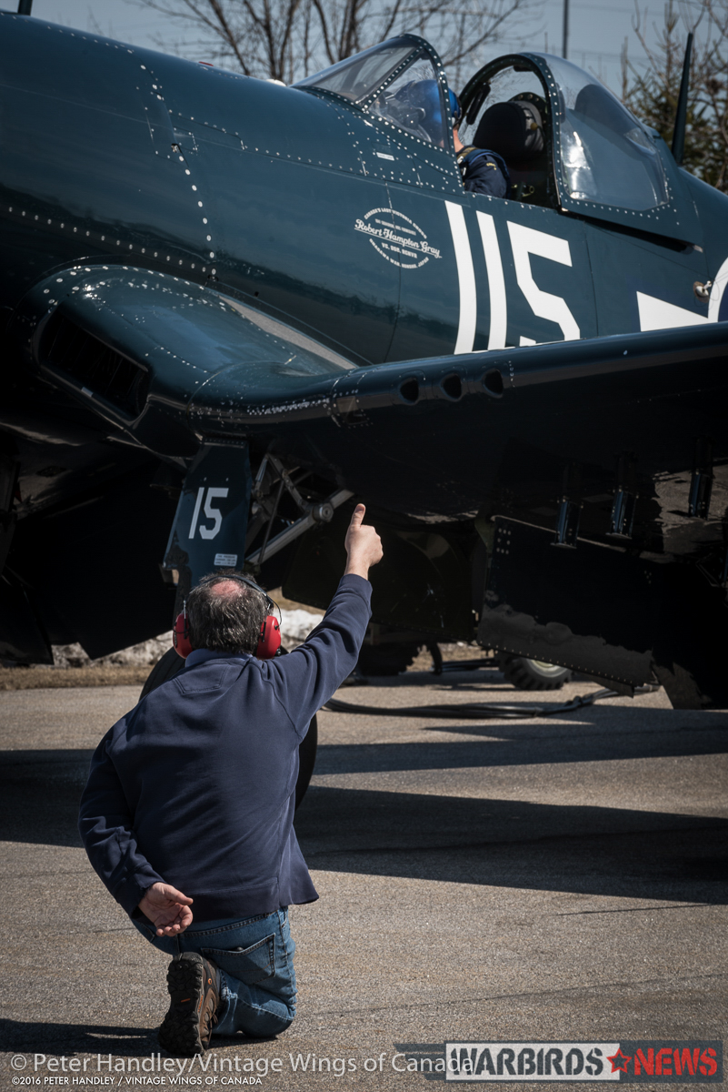 Vintage Wings of Canada Corsair - Interview With Test Pilot Paul Kissman 14 André Laviolette giving Paul Kissman the thumbs up to start the Corsair. (photo by Peter Handley)