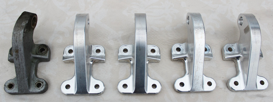 XP-82 Twin Mustang - January 2016 - Restoration Update 15 The four, freshly-remanufactured gear hinges sitting beside the damaged original pattern part (left). (photo via Tom Reilly)