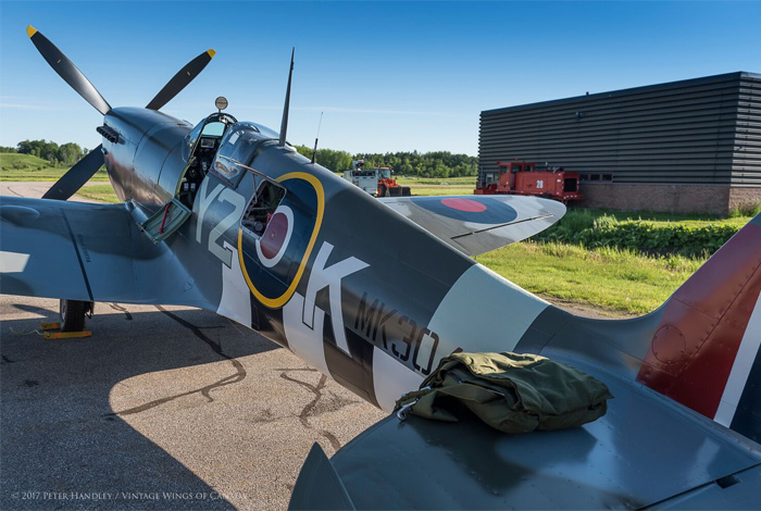 The First Flight of the Roseland Spitfire 12 After many years, Spitfire Mk IX TE294, wearing the markings and serial number of Y2-K, a 442 Squadron Spitfire, sits in the morning sun on the ramp at Vintage Wings of Canada, ready to go flying for the first time in many decades. The build is finished, the engine tested, taxi tests complete and the weather is gorgeous. Nothing left to do now except go flying. Photo: Peter Handley, Vintage Wings of Canada