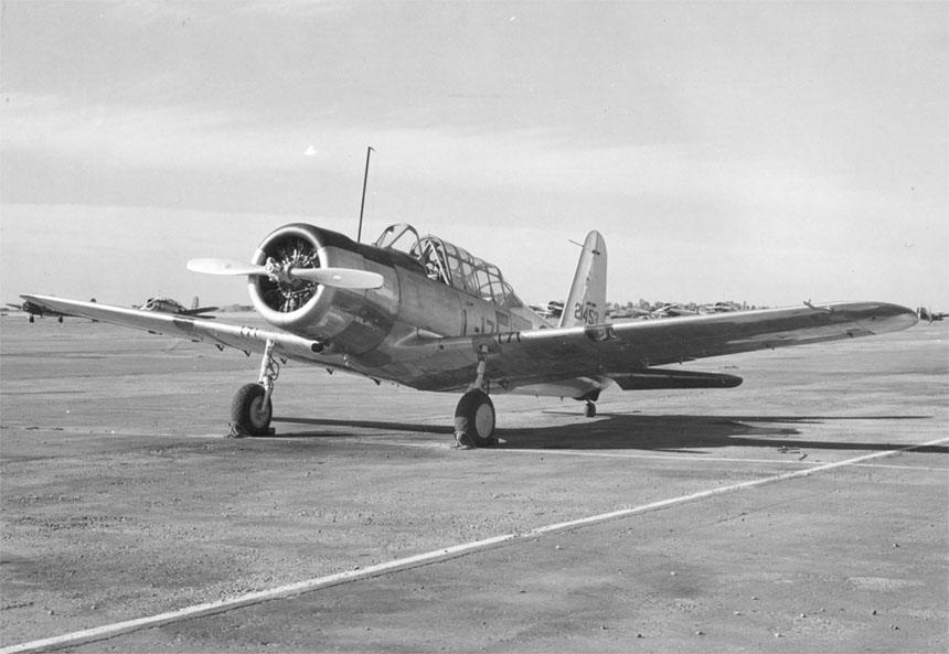 The Hughes H-1 Racer: Howard Hughes' Silver Bullet 42 A U.S. Army Air Forces Vultee BT-13A (s/n 42-1453) on the runway at Minter Field, California (USA), on 1 March 1943.