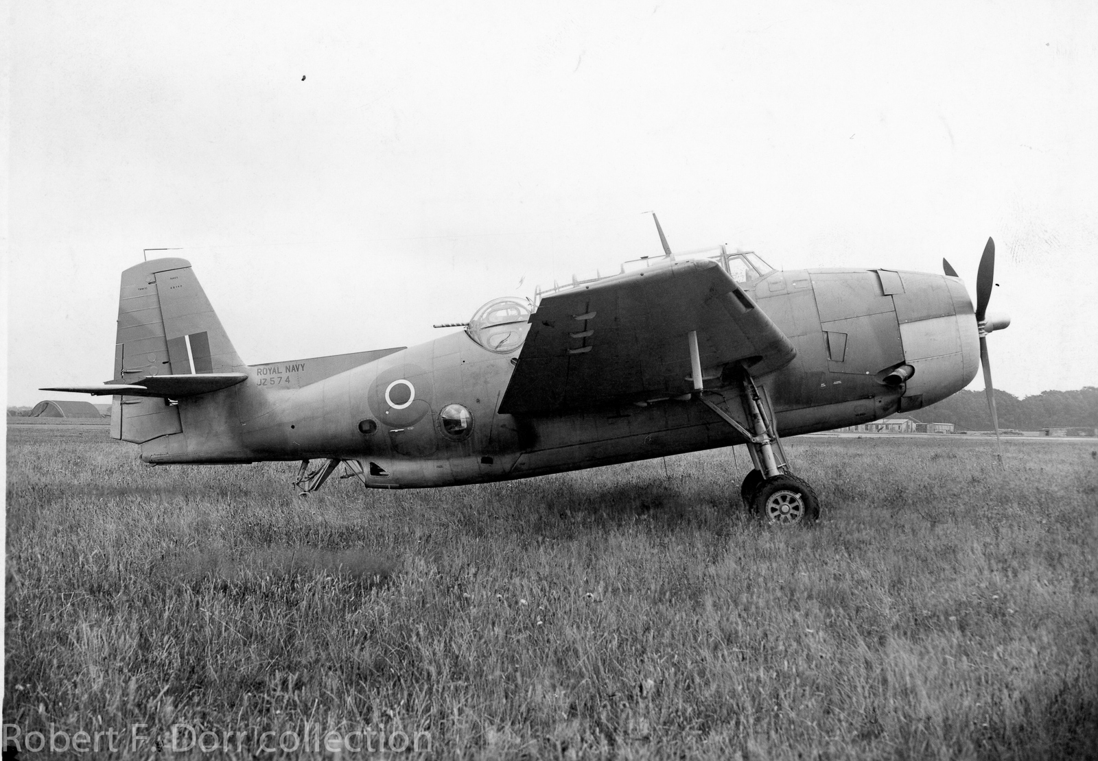 "Not a fighter:" Explaining the TBM-3E Avenger 11 JZ574, an Avenger Mk.II of the Royal Navy's Fleet Air Arm at Boscombe Down, a test establishment in Wiltshire, England. JZ574 served in the Pacific Theatre with 820 Squadron aboard HMS Indefatigable between December 1944 and April, 1945. (photo via Robert F. Dorr collection)