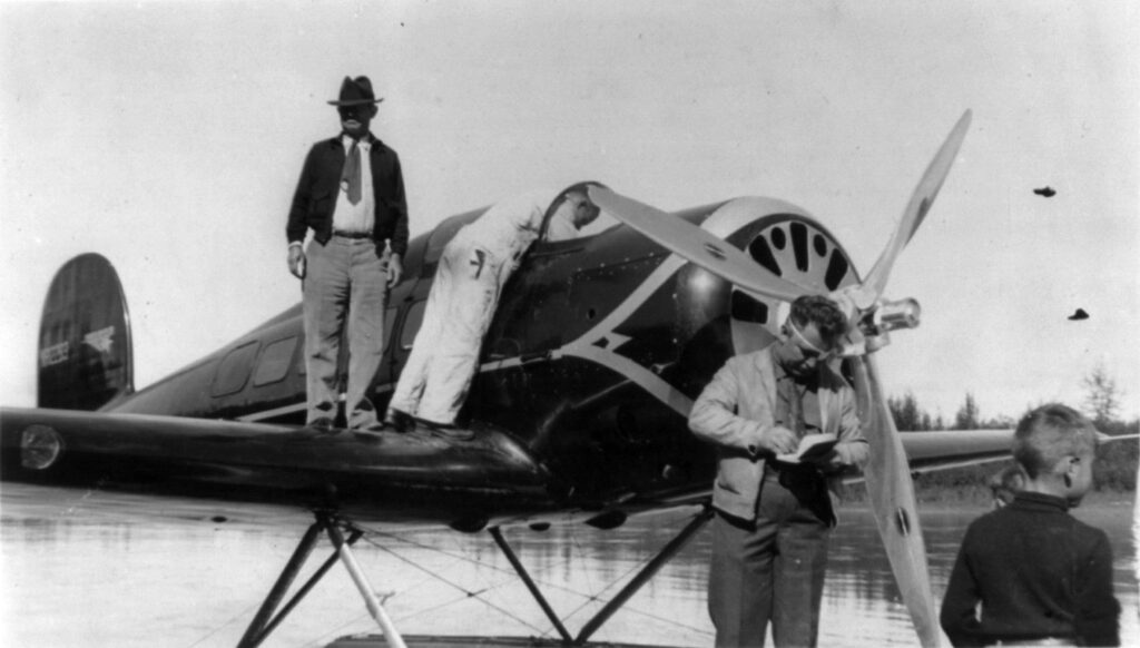 Wiley Post & Will Rogers Die in Point Barrow Crash 14 Will Rogers and Wiley Post with Explorer Orion August 1935 Library of Congress
