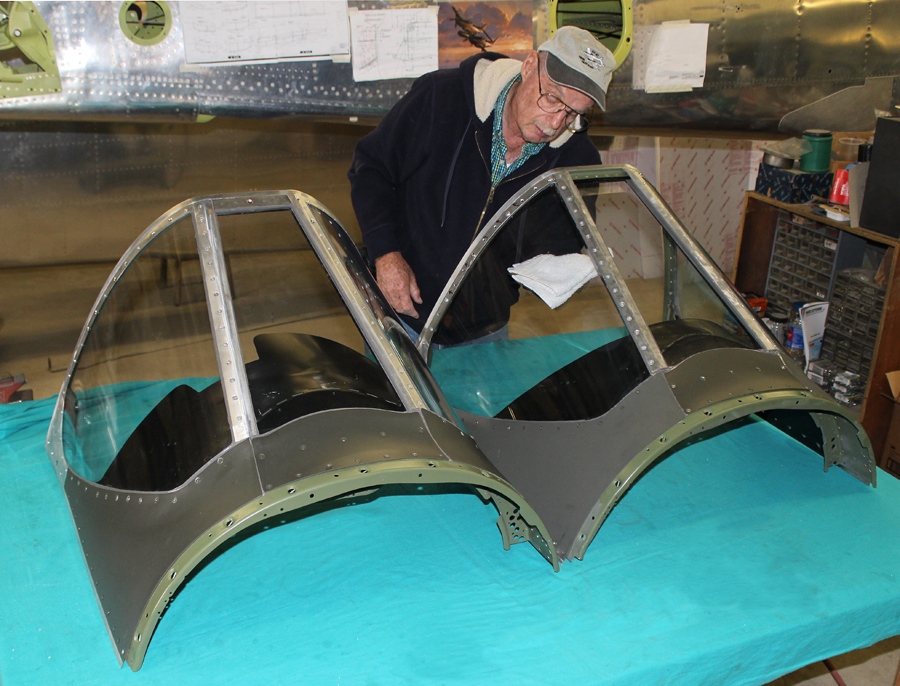 XP-82 Twin Mustang - Feb.-April, 2015 - Restoration Update 24 Tom Reilly working on the windscreens. (photo via Tom Reilly)