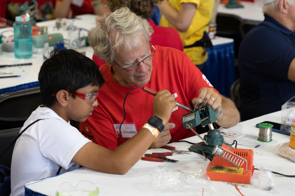 Expanded Youth and Family Activities at EAA AirVenture Oshkosh 2024 11 Youth KidVenture 22 soldering MSteineke 2469