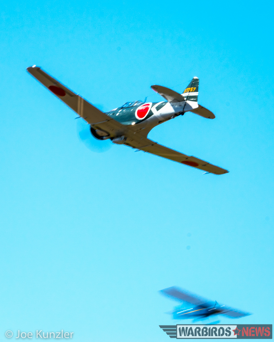 Props & Ponies at the Heritage Flight Museum - Air Show Report 35 The Zero attempting to intercept the Interstate Cadet. (photo by Joe Kunzler)