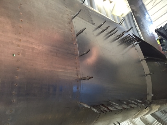 XP-82 Twin Mustang - December 2015 - Restoration Update 14 Fitting out the other remaining close out panel on the radiator housing. (photo via Tom Reilly)