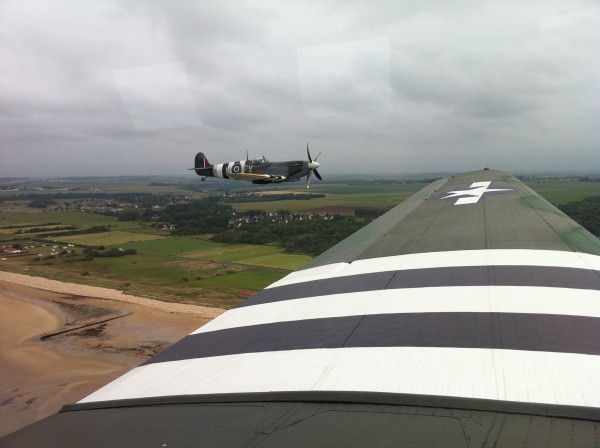 DakotaAir Will Bring Passenger Flights Back To The UK Honoring The RAF Transport Command 10 Picture taken in Normandy in 2012 from "Drag 'Em 'Oot" showing the Spirit of Kent Spitfire of Biggin Hill.