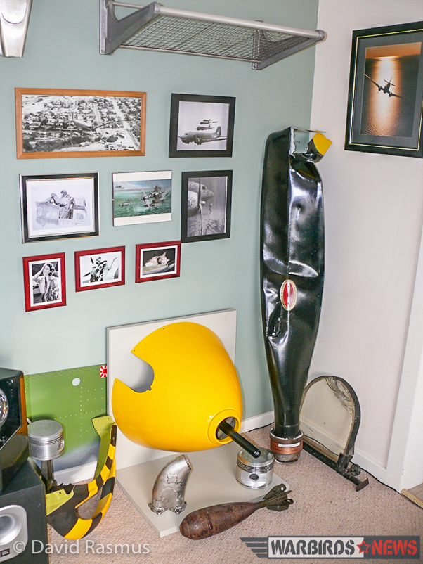 Restoring a Dakota Cockpit Downunder! 13 Some of David Rasmus's warbird trophies, including a bent propeller blade and spinner from a P-39. (photo via David Rasmus)