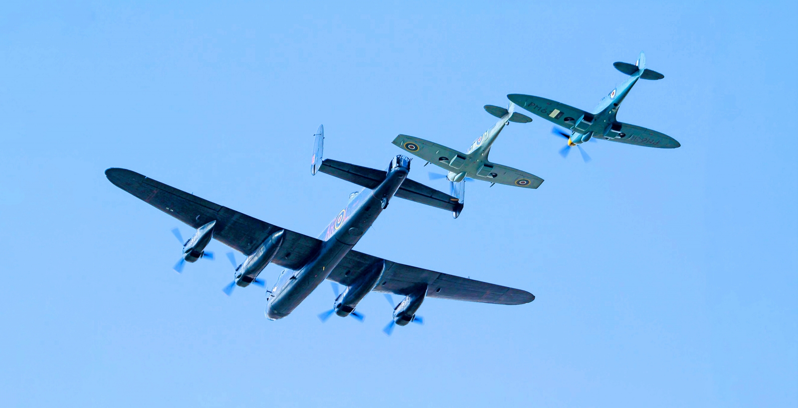 The Battle of Britain Memorial Flight Hosts 2025 Members’ Day at RAF Coningsby 15 he Lancaster and two Spitfires performed a second three ship display. Photo Phil Cooke