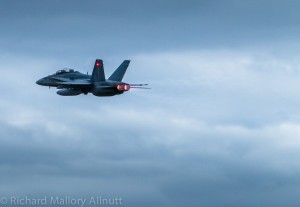 Air Show Report:Wings Over Gatineau 14 A CF-118 Hornet blasts off into the darkening clouds in Gatineau, Quebe