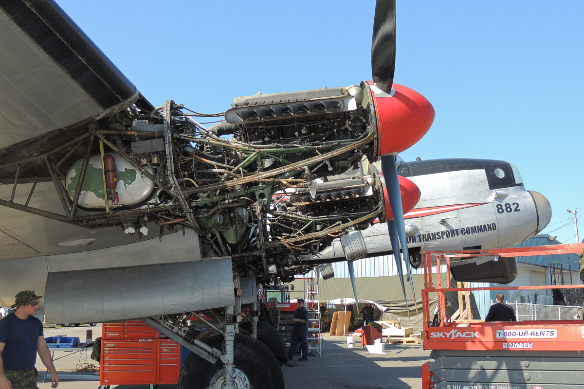Lancaster KB882 Safely At Her New Home 10 Dismantling KB882 for her new home in Trenton, Ontario began in Edmundston, New Brunswick on September 19, 2017. Here, the engine cowlings have been removed in preparation for dismounting the engines. (photo by Joanna Calder, DND)
