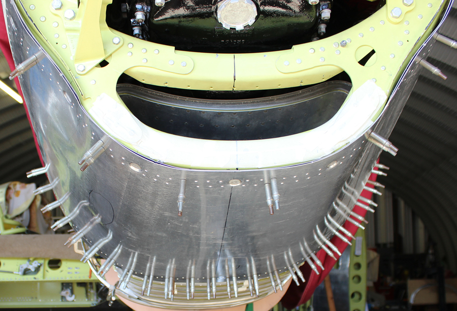 XP-82 Twin Mustang - January 2016 - Restoration Update 17 The lower cowling for the left hand fuselage being trial fitted. The temporary Cleco fasteners are holding the skin to the frame to allow Reilly, a master of the English Wheel, to see if he needs to make any adjustments. (photo via Tom Reilly)