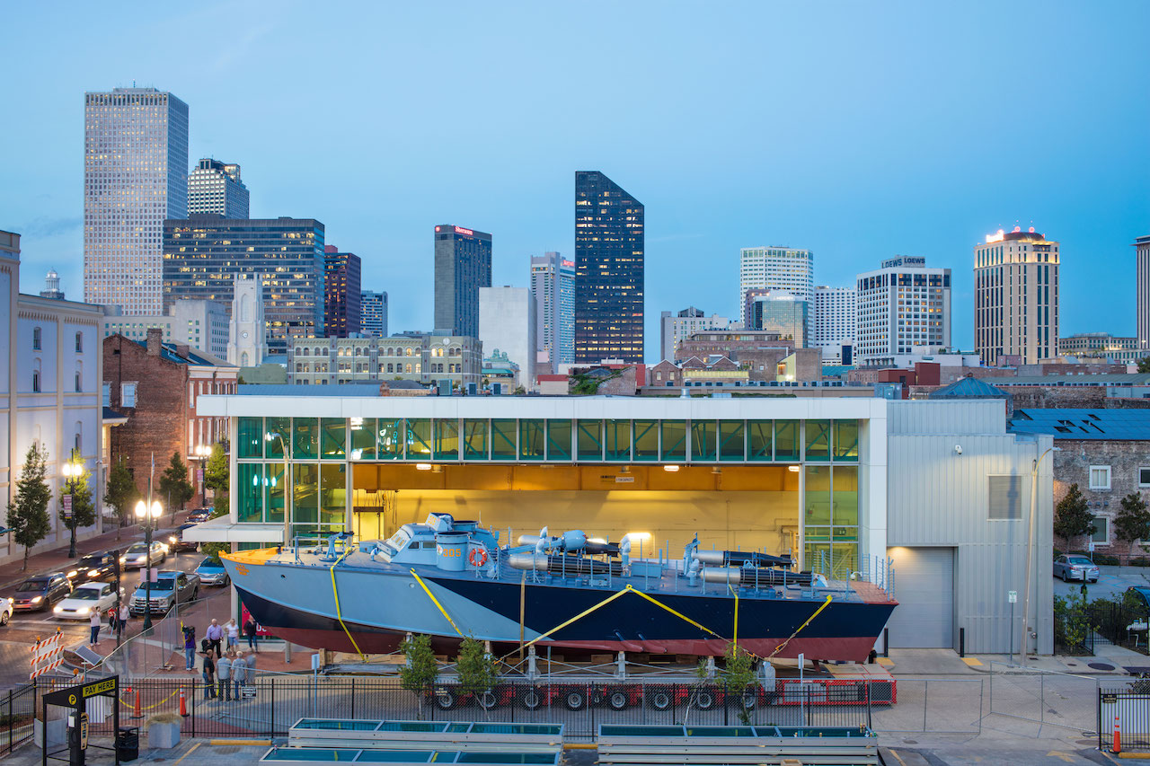 The National WWII Museum Launches Rides Aboard Restored, Operational Higgins Patrol-Torpedo Boat 11 After removing the glass exterior walls of John E. Kushner Restoration Pavilion, PT-305 is placed on a crawler and moved outside to begin her journey back to water.