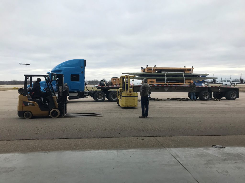F-117 On The Move - Michigan's Air Zoo Adds a Nighthawk! 12 semi with plane taking off truck 1
