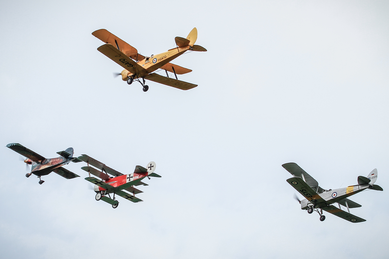 Airshow Report : 2014 SoliDali Airshow 12 The world renowned AEROGALLO (Flying Rooster ) in formation with the Fokker and two Tiger moth.