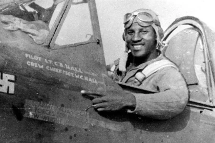 1st Lieutenant Charles B. Hall in the cockpit of his Curtiss Wright P 40L Warhawk