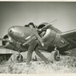 Amelia Earhart Hangar Museum to Present “ADVENTURE AMELIA: A Conversation With Explorers in Search for Earhart’s Plane” 10 8 Amelia Earhart walking in front of her Lockheed Electra 10E courtesy Purdue University Libraries