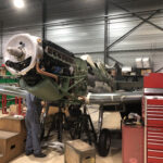 Aero Legends' Spitfire MJ444 Restoration Update 10 A quick visit to Duxford on 14th February and MJ444’s Merlin 500 engine is now fitted. This variant of the Merlin has a single stage supercharger, resulting in increased performance and reliability (Photo Peter Hall)